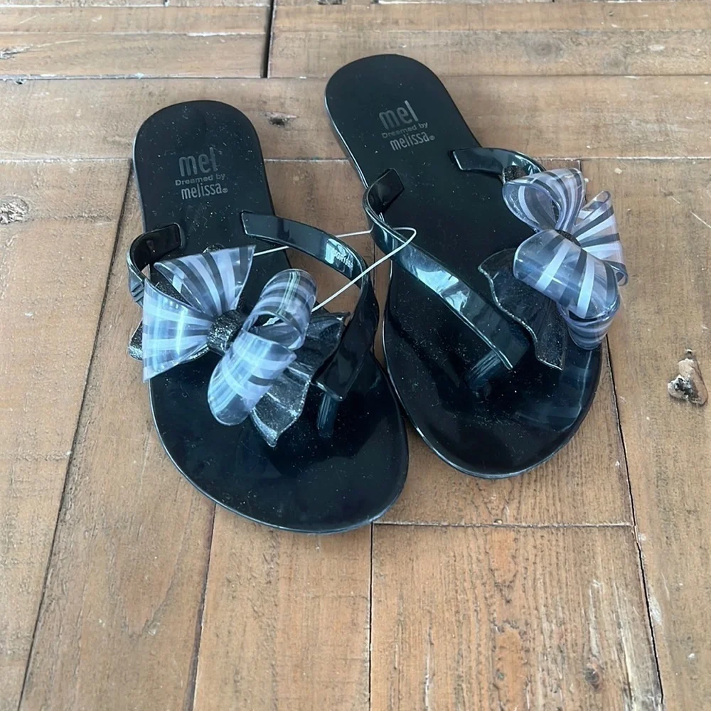 Mini Melissa Mel harmonic black bow flip flop sandals